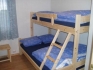 Vega Opplevelsesferie Ferienappartement EG: Schlafzimmer mit Familienstockbett